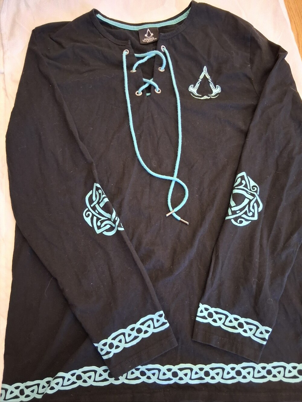 Assasin's Creed Black Quarter Long Sleeve Tee with Teal Trim